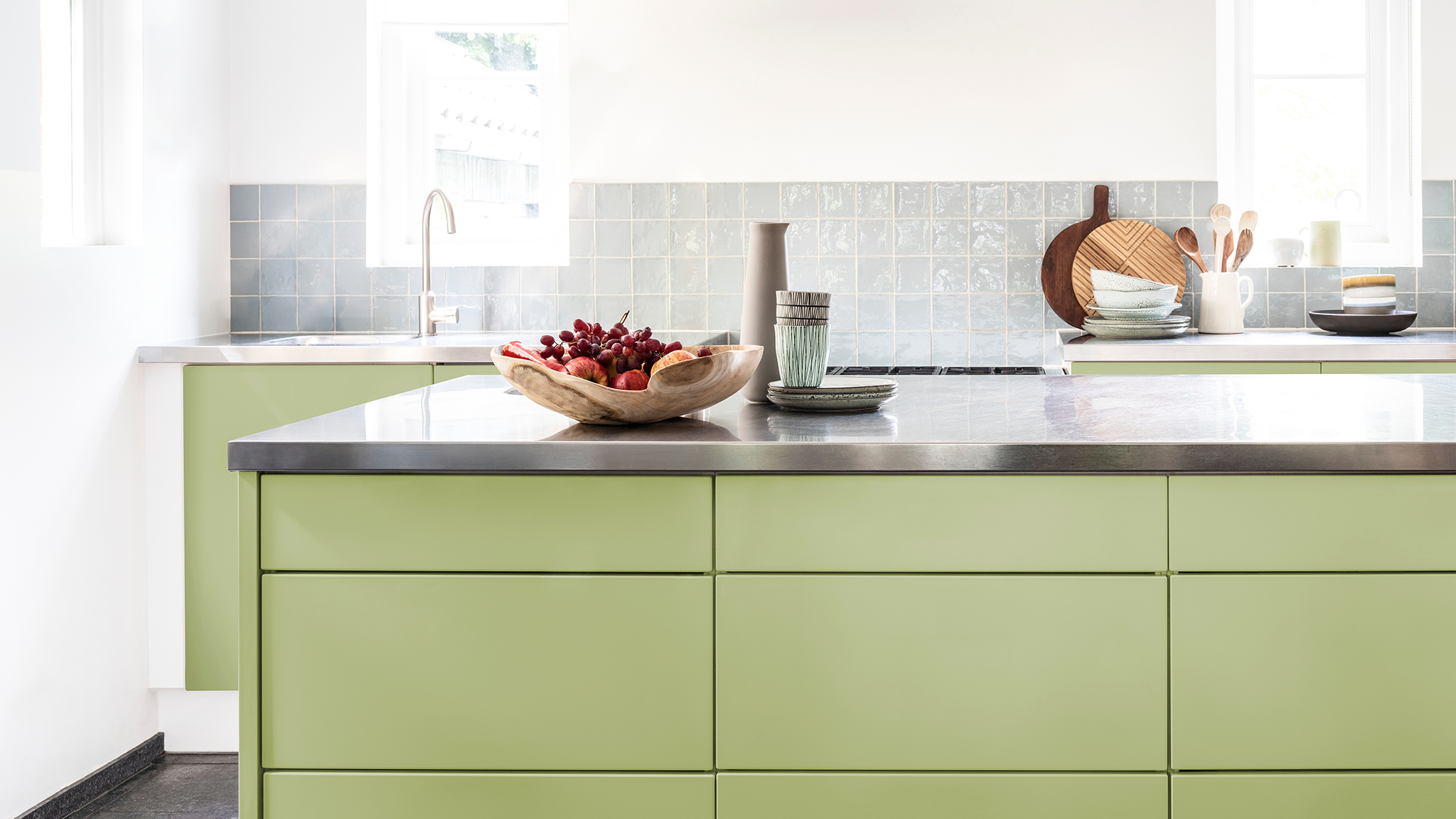 A kitchen with green cabinets and metal counter top dulux-simply-refresh-kitchen-cabinets-ideas-global-2