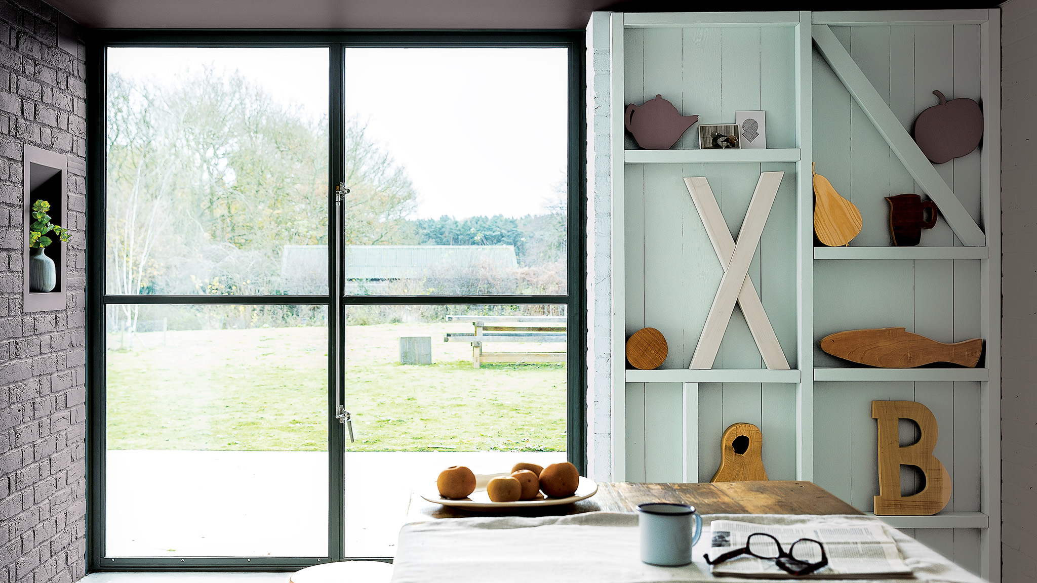 Light blue paneling and shelving with ornaments dulux-simply-refresh-wall-panels-ideas-global-3