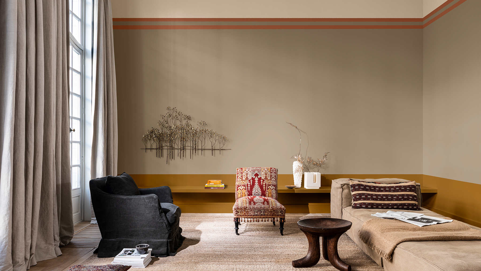 Living room painted in Brave Ground with a golden low horizon line and a cream high split wall Dulux_CF21_Colour_of_the_year_Timeless_colors_global_1