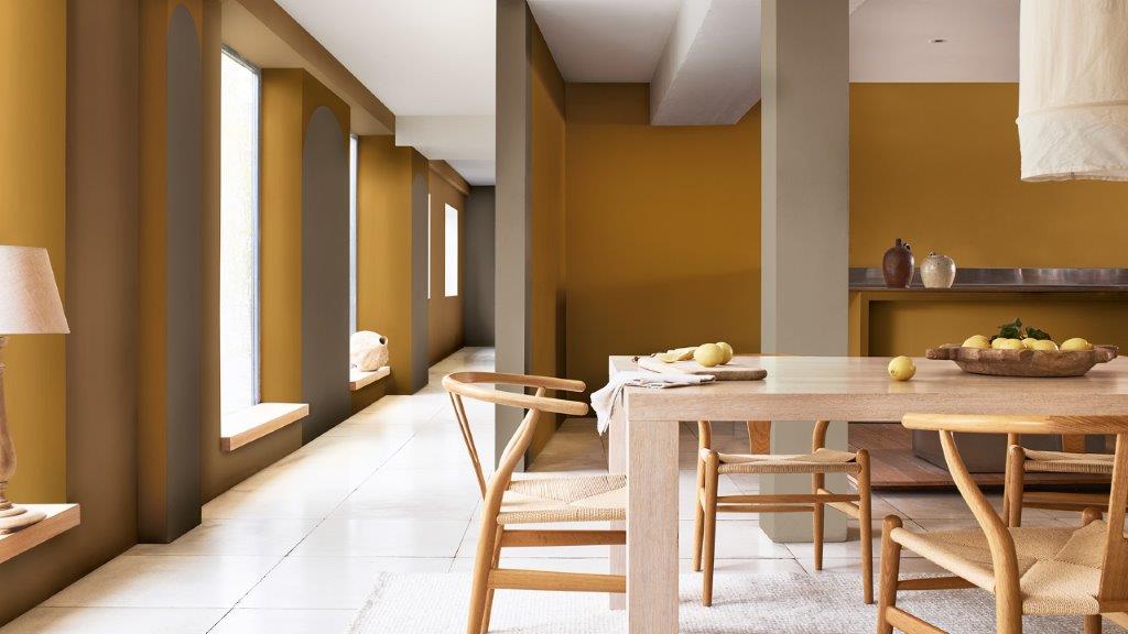 Open plan dining room with wooden table and tall windows on left-hand side Dulux_CF21_how-to_arch_dining room with windows_Global_5